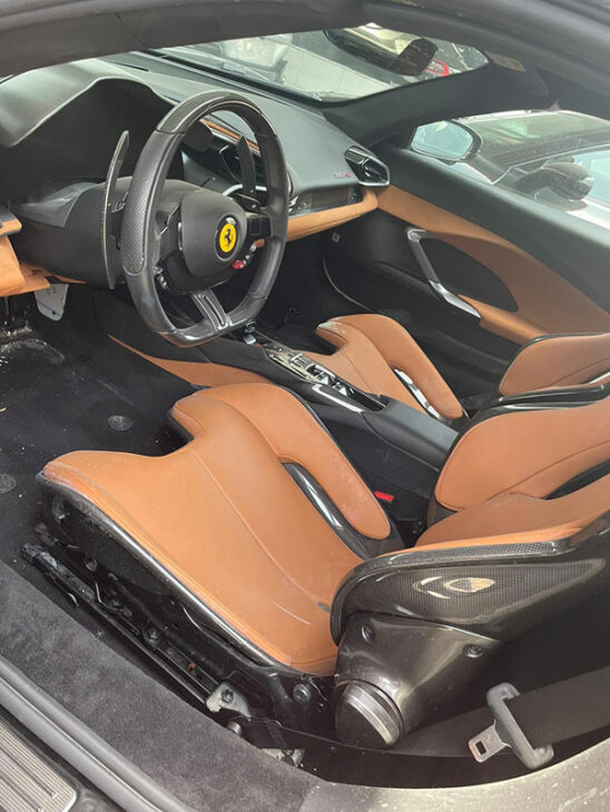 Rapatriement Ferrari voiture accidentée inondée - Import Export - DTI